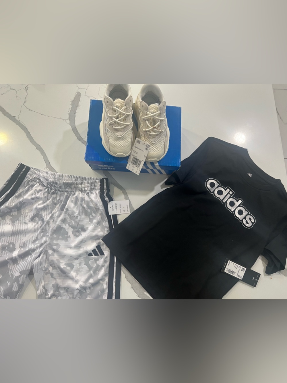 adidas Black Logo Tank with White/Gray Pattern Shorts and Cream Sneakers